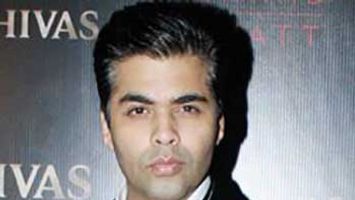 Karan Johar to adopt a child
