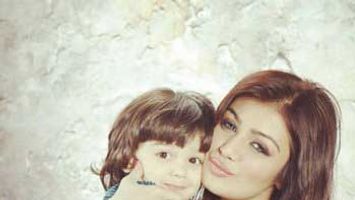 Ayesha Takia poses with her cute son