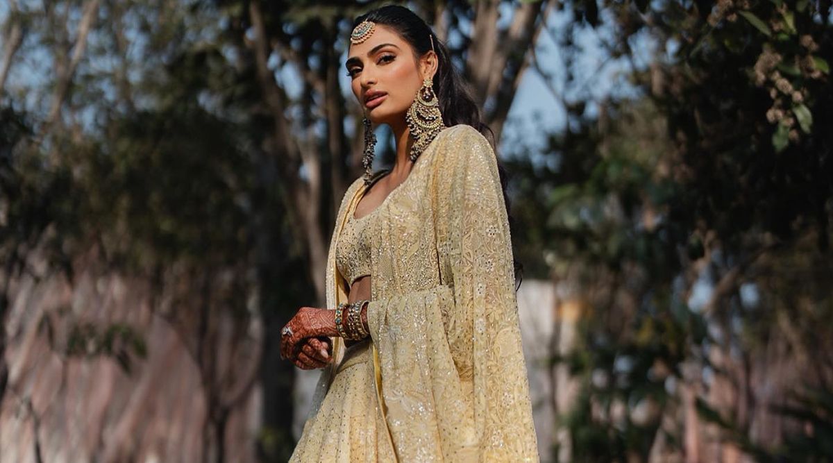 Athiya Shetty in pastel yellow chikankari, she totally brightened up our day! Add this ethnic touch to your mehendi!