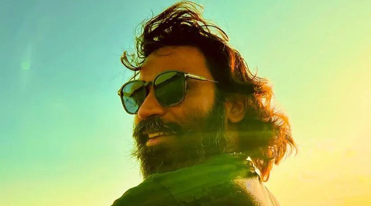 Fans laud Dhanush as he shares his look from his upcoming film Captain Miller flaunting long hair, a beard, and a moustache