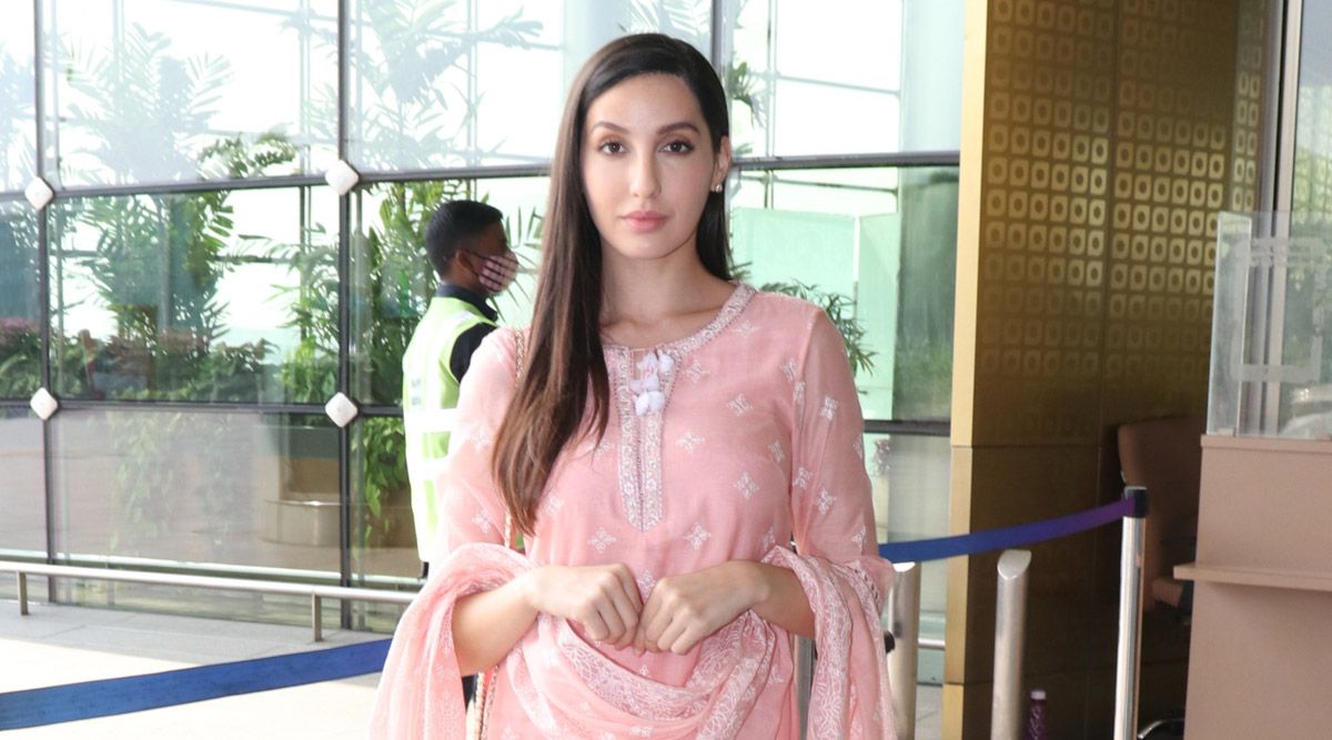 Nora Fatehi spotted at airport departure