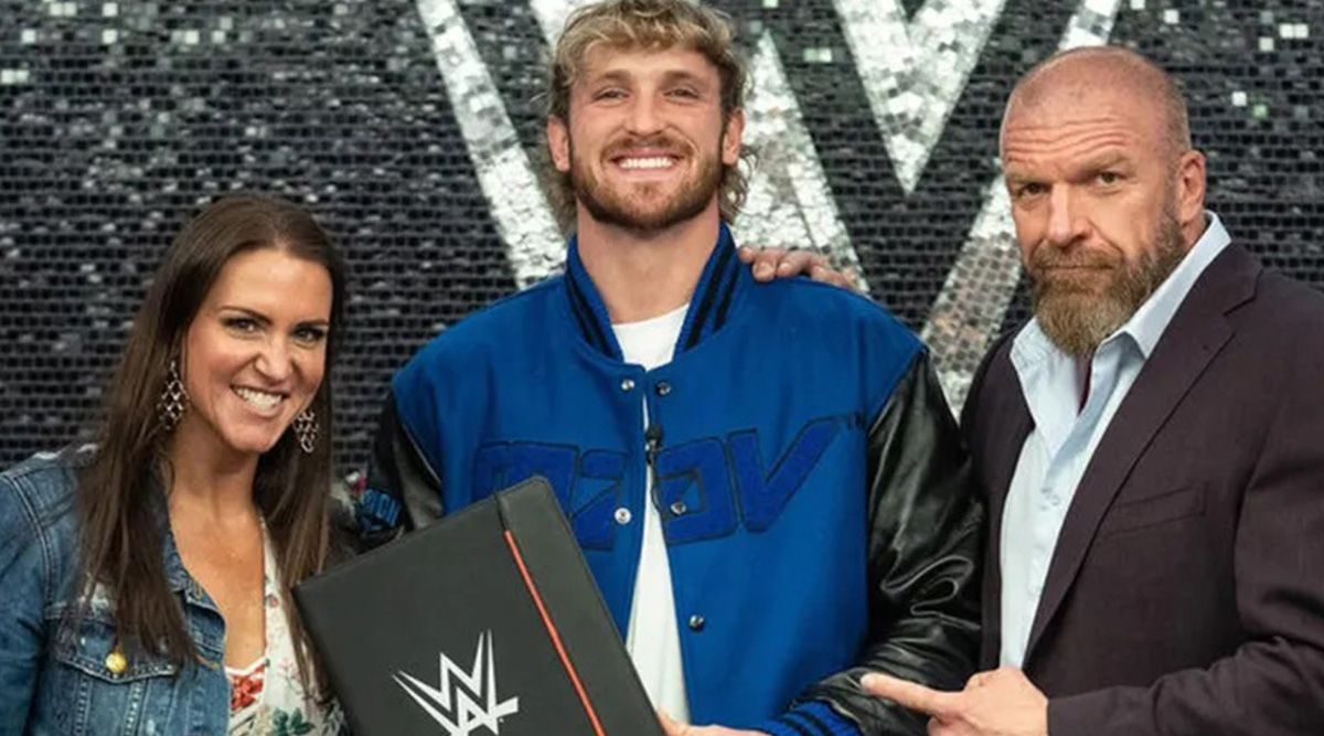 Logan Paul poses with Triple H; YouTuber-turned boxer signs WWE contract