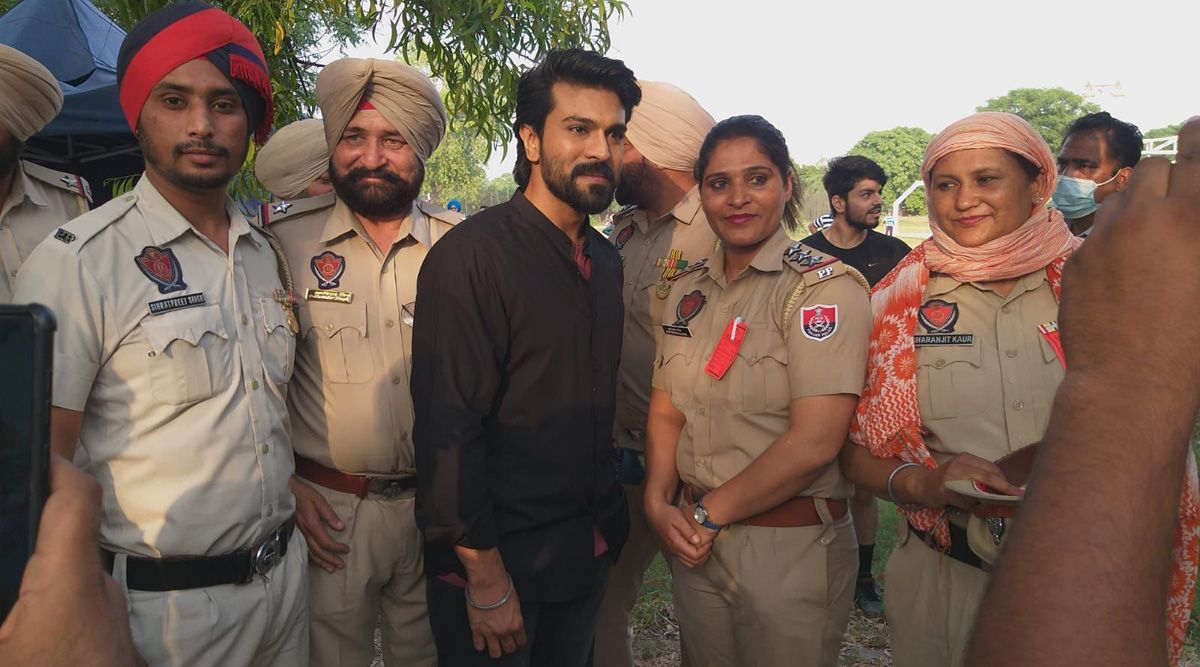 Ram Charan poses for pictures with Punjab cops while filming a new schedule for Shankar's RC15