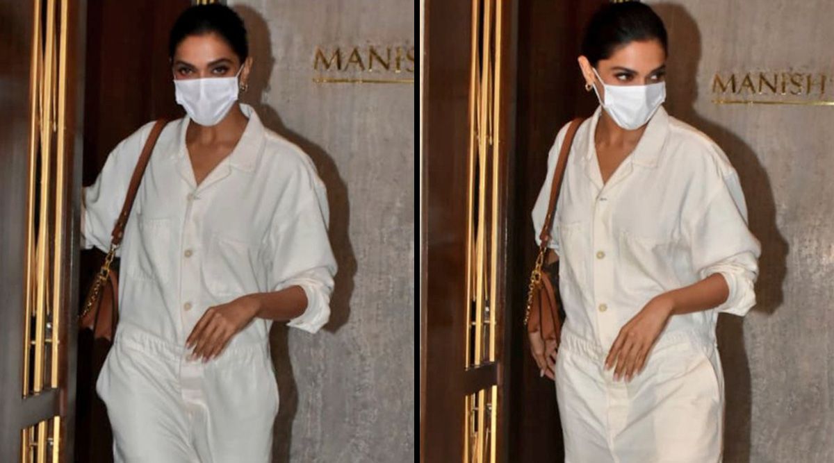 Deepika Padukone sashays in a white jumpsuit; teams it up with Rs 2.29 lakh LV bag