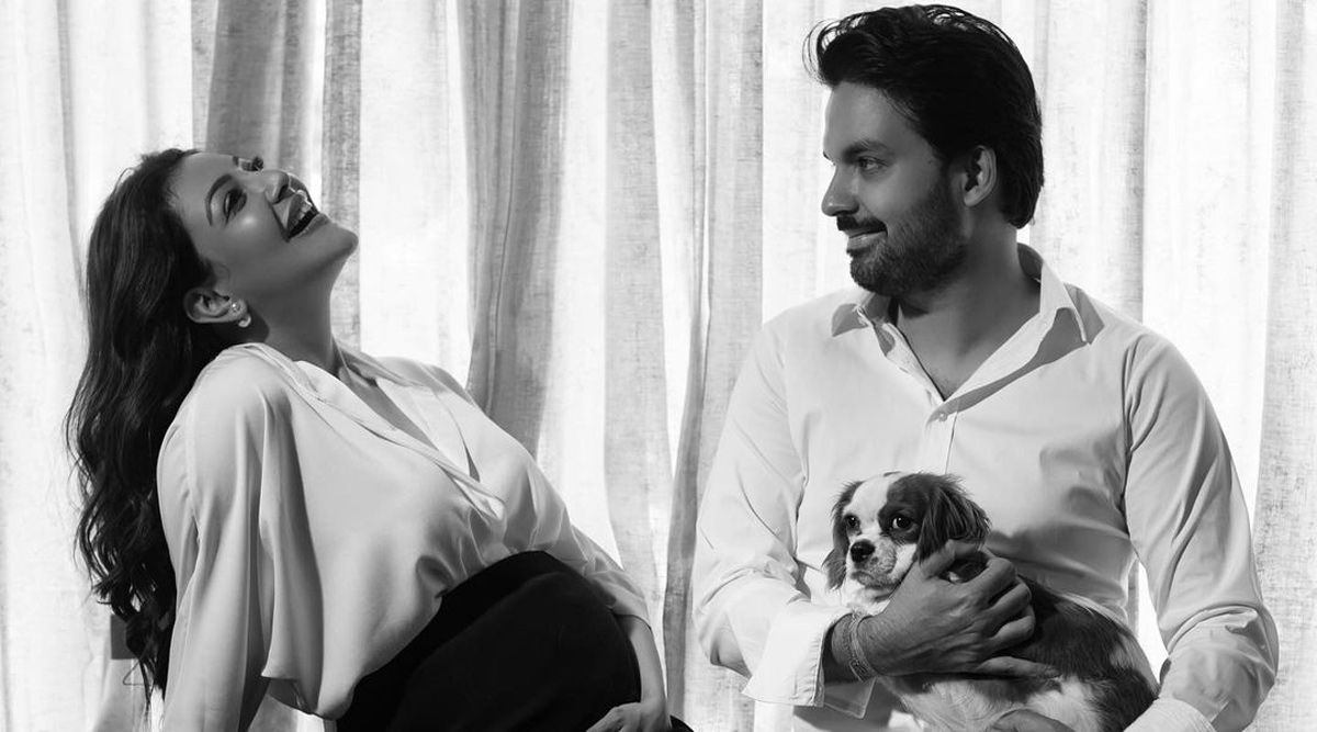 Mom-to-be Kajal Aggarwal looks beyond happy as she flaunts her baby bump in recent family portrait with husband & dog