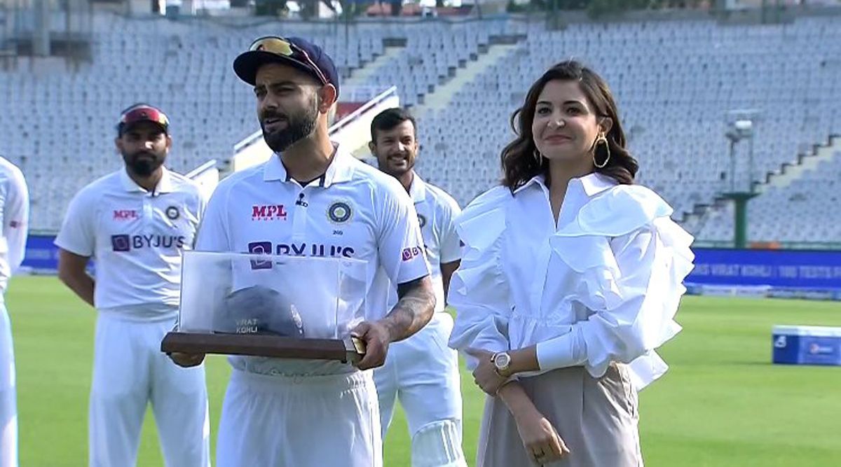 Virat Kohli celebrates his 100th test match appearance with wife Anushka Sharma by his side