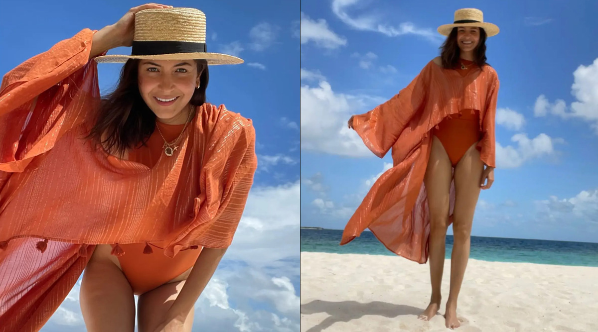 Anushka Sharma slays in an orange swimsuit as she takes her own pictures at the beach
